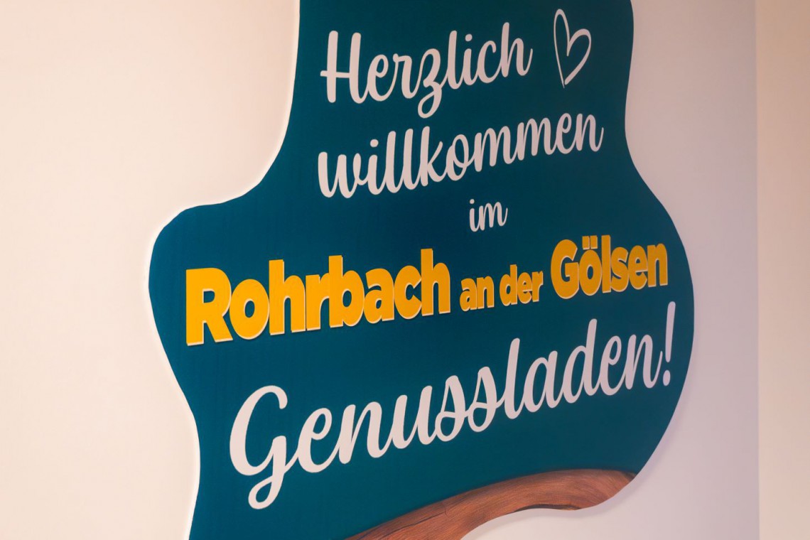 BioSympatic-Rohrbach Genussladen- Herzlich willkommen Schild