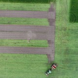 Bild anzeigen: Grand Farm, Flugaufnahme von den Feldern