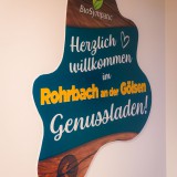 Bild anzeigen: BioSympatic-Rohrbach Genussladen- Herzlich willkommen Schild