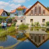 Bild anzeigen: Winzerhaus Hans Schöller mit Teich