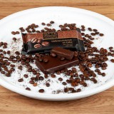 Bild anzeigen: Teller mit Schokolade und Kaffeebohnen