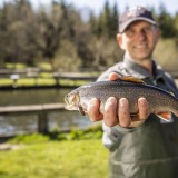 Bild anzeigen: Heinz Heinisch Portrait mit einem Fisch